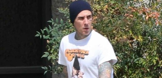 Travis Barker looks somber as he goes solo in LA without pregnant wife Kourtney Kardashian after 'medical emergency' | The Sun