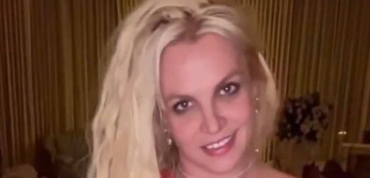 Britney Spears goes braless in dangerously cut-out scarlet dress for steamy video to Madonna song at LA mansion | The Sun