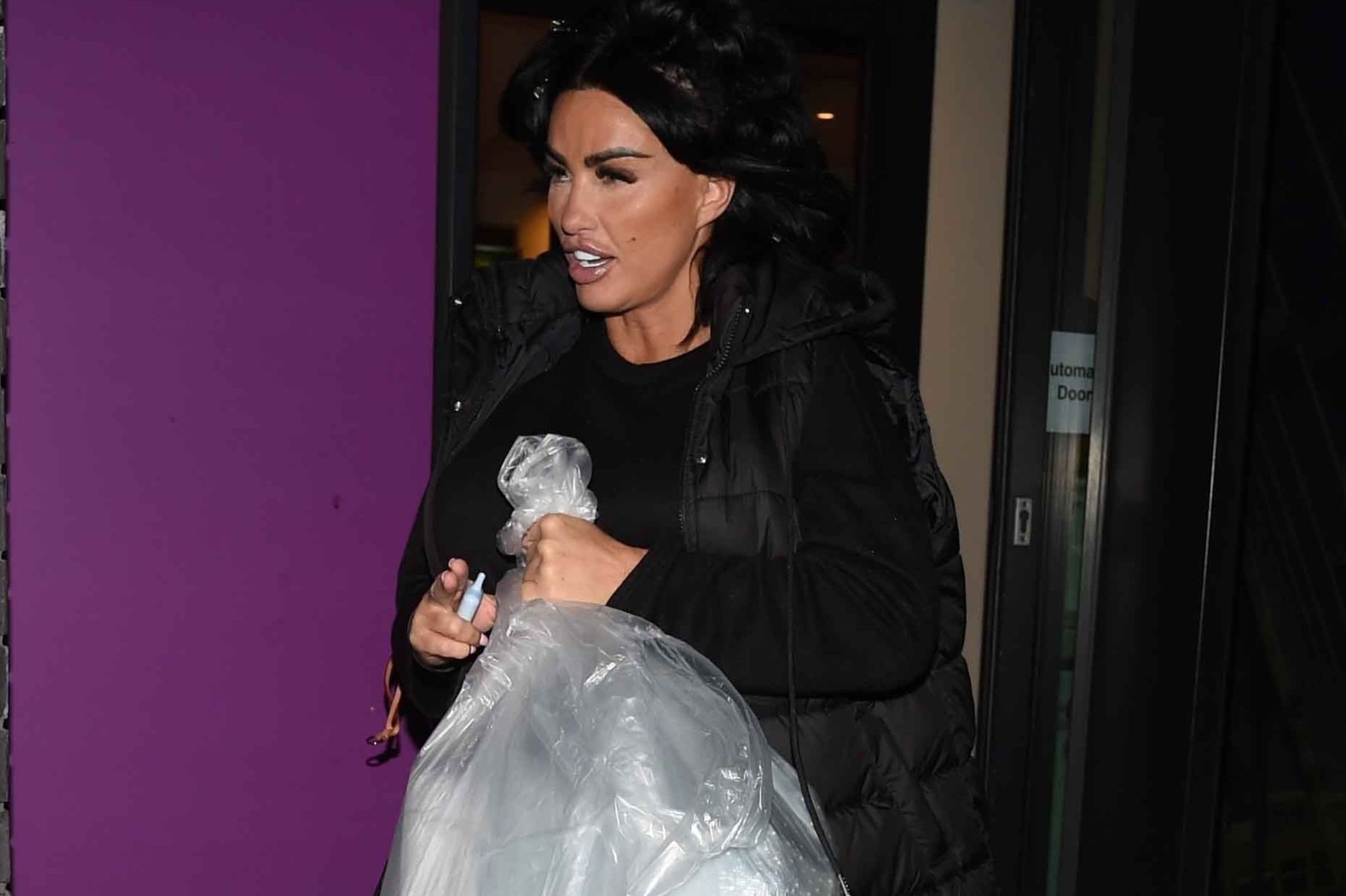 Katie Price carries huge bag in front of her stomach after sparking pregnancy rumours | The Sun